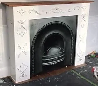 CUSTOMERS PHOTO - Design project - Blind fitted within the fireplace to hide the TV